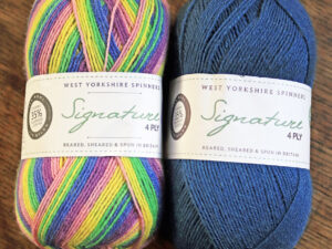 WYS Signature 4 ply Wildflower and Juniper yarn. West Yorkshire Spinners Signature 4 ply yarn that is also great for sock knitting as it contains Nylon and polyester to make it hard wearing. These two shades are shade 845 Wildflower and shade 157 Juniper, which complement each other quite well so the blue of the juniper could be used as a contrast on the cuffs, heels and toes of socks knitted from the Wildflower.