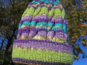 Green, lilacs and purples adults’ hat
