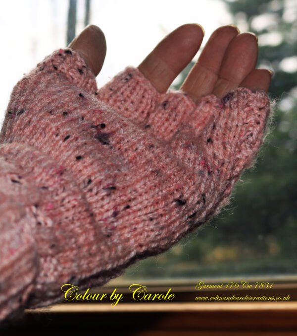 Pink tweedy fingerless gloves A pair of pink fingerless gloves designed and hand knitted by Carole Wareing of Colin and Carole’s Creations and The Wool Boat. These are adult sized gloves for a person with larger hands, and are quite long in the cuff which can be rolled over for extra warmth, ideal for gardening, typing, mechanicing, It work, locking, bicycling.... The gloves are for sale for £10.00 including delivery to a uk address They are knitted from J C Bretts a pink with brown flecks shade of Top Value double knitting acrylic yarn.