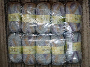J C Bretts Marble dk yarn MT52 10 ball pack in fawn and grey shades.