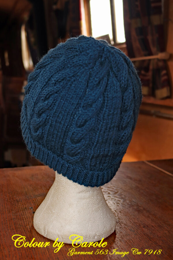 An adult’s hat in a shade of blue yarn called “Norby” hand knitted by Carole Wareing. This hat is knitted from the yarn “The Croft” spun by West Yorkshire Spinners from Shetland Islands wool The yarn is 100% Shetland Islands Wool in a double knitting weight and comes in 100grm skeins, (225 meters). Cost at 14.3.2022 is £9.50 per 100 gram skein. Carole has created the hat from this fleece and reports it’s lovely to knit with. Image Cw 7918 copyright Colin Wareing of Colin and Carole’s Creations The hat is for sale at £20 or £25 including delivery to a UK address.