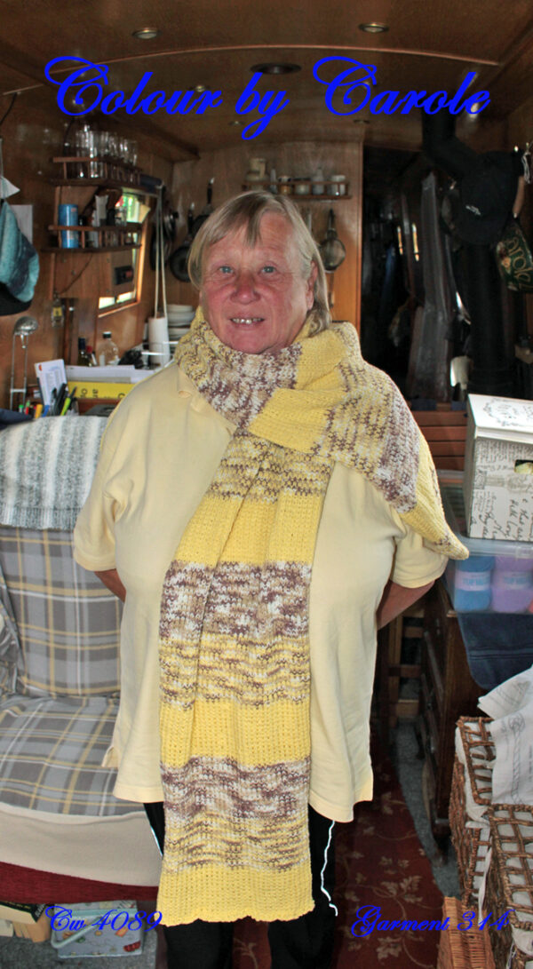 Yellow and beige wrap Carole has hand knitted this wrap from J C Bretts Cotton on yarn, which is a cotton and acrylic mix. Two shades have been used to create this garment, a solid yellow one and a variegated brown one to provide a nice contrast. The wrap is lovely and warm, great for keeping the wearer warm and toasty. This wrap would make a nice present for someone, for Christmas or birthday, or just to say I love you. The wrap is approximately 68 inches long and 15 inches wide. The yarn is machine washable Hand knitted aboard the narrow boat “Emma Maye” from where the wrap can be picked up or it can be posted out to a uk address.