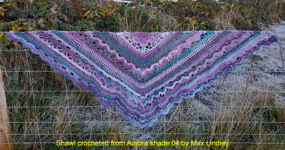 Both crochet shawls are inspired by 'Spring Showers Shawl' by Maria Bittner.

Shawl 1, crochet in James C Brett Aurora DK in Shade 04.
Weight 175gm's, width 68", Depth 26".