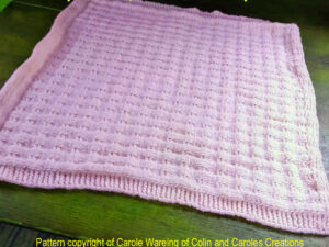 Pattern for a baby blanket that Carole has knitted and people followed the knitting of it through her Sunday Stitches posts on social media.