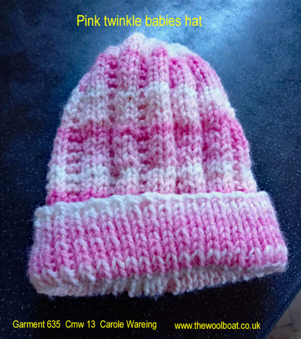 A pink twinkle babies hat hand knitted aboard the narrow boat “Emma Maye” in Lancashire by Carole Wareing of Colin and Carole’s Creations. For a baby up to about 18 months old Great for an adult or teenager, Created from shade BTP 20 from J C Brett’s “Twinkle prints” range. Colour – Pinks and whites with a ribbed pattern Machine washable at 30 degrees C The price is £8 including delivery to a uk address, or come and pick up from The Wool Boat. Garment 635 Garment 635 Cmw 13 Carole Wareing