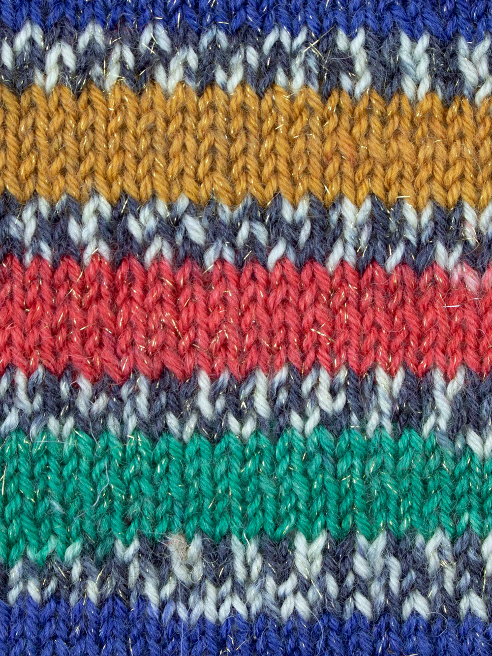 4 ply knitting or crochet yarn from the West Yorkshire Spinners Signature 4 Ply range.75% Wool - 25% Nylon. The wool content contains 35% luxurious Blue faced Leicester making this one of the most sumptuous 4 Ply products on the market. It is ideal for socks and more! West Yorkshire Spinners, reared, sheared and spun in Britian. British Wool Mark Makeup - Size 100gm balls (400m) Tension 36rs x 28sts - 10cm sq - 3.25mm (US3) needles Excellent Value at £8.50 per ball available from The Wool Boat or we can post out to a UK address for the £8.50 plus postage if applicable. Machine Wash 30° This is the Nutcracker shade, no 1166, in shades of red blue and green with a sparkle. This is one of the Christmas yarn collection. We also have a sock and shawl pattern booklets and patterns to go with the yarns. Collect from The Wool Boat moored near Burscough in West Lancashire or this yarn can be posted out to a UK address with postage and packing added if applicable. Thank you for having a look, Carole, and Capt Col on The Wool Boat.