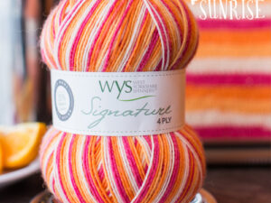 4 ply knitting or crochet yarn from the West Yorkshire Spinners Signature 4 Ply range.75% Wool - 25% Nylon. The wool content contains 35% luxurious Blue faced Leicester making this one of the most sumptuous 4 Ply products on the market. It is ideal for socks and more! West Yorkshire Spinners, reared, sheared and spun in Britian. British Wool Mark Makeup - Size 100gm balls (400m) Tension 36rs x 28sts - 10cm sq - 3.25mm (US3) needles Excellent Value at £8.50 per ball available from The Wool Boat or we can post out to a UK address for the £6 plus postage if applicable. Machine Wash 30° This is the Tequila Sunrise shade, no 856, in shades of orange, which has now been discontinued, so limited stocks. We also have a sock and shawl pattern booklets and patterns to go with the yarns. Collect from The Wool Boat moored near Burscough in West Lancashire or this yarn can be posted out to a UK address with postage and packing added if applicable. Thank you for having a look, Carole, and Capt Col on The Wool Boat.