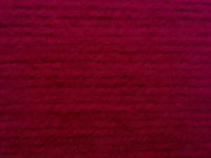Top Value DK premium acrylic yarn Available in range of shades. This is shade 8470 in a shade of Red/Maroon.