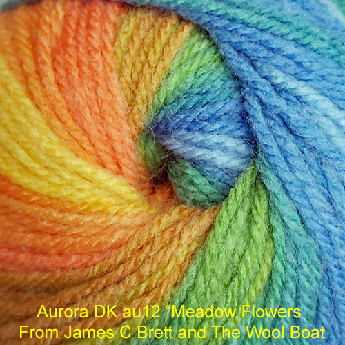 James C Bretts Aurora Double knitting and crochet yarn Machine Washable 80% Acrylic 20% Wool 100-gram balls, 4 mm needles, 345 meters / 377 yards knits to most DK patterns. Tension 22sts+28 row per 10cm / 4inc square. Machine Washable in a mild machine wash. This one is AU 12 in shades of orange, green and blues called Meadow Flowers. Dye lot no is 81 This yarn can be posted out to a UK address which will plus postage and packing if applicable. Thank you for having a look, Carole, and Capt Col on The Wool Boat.