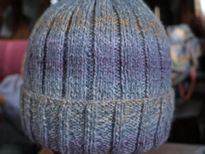 Shades of fawn and grey ribbed hat Marble ribbed hat in shades of fawn and grey. A ribbed adult hat hand knitted aboard the narrow boat “Emma Maye” in Lancashire by Carole Wareing of Colin and Carole’s Creations. Great for an adult or teenager, Colour – shades of fawn and grey in marbled yarn. Acrylic yarn, machine washable at 30 degrees C The price is £10 or can be posted to a uk address with p and p if applicable. Created from a shade MT 52 from J C Brett’s “Marble DK” range which we stock on The Wool Boat. Hand knitted by Carole Wareing Garment 745 Cw 9468